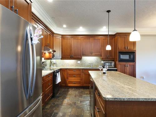 215-3666 Royal Vista Way, Courtenay, BC - Indoor Photo Showing Kitchen With Upgraded Kitchen