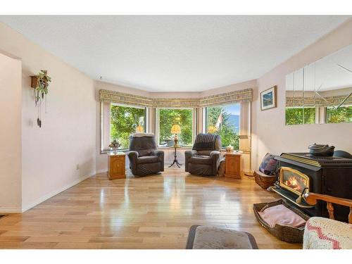 20 18 Street, Salmon Arm, BC - Indoor Photo Showing Living Room With Fireplace