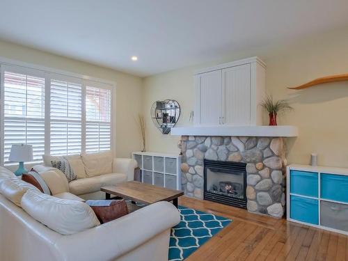 1053 Paret Crescent, Kelowna, BC - Indoor Photo Showing Living Room With Fireplace