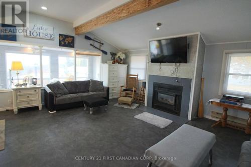 72254 Cliffside Dr, Bluewater, ON - Indoor Photo Showing Living Room With Fireplace