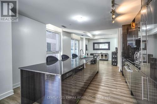 #325 -30 Nelson St, Toronto, ON - Indoor Photo Showing Kitchen With Double Sink With Upgraded Kitchen