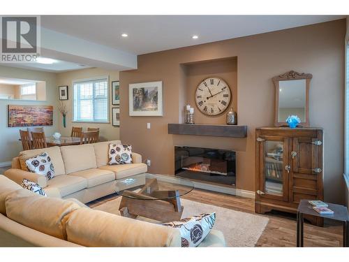 2450 Radio Tower Road Unit# 116, Oliver, BC - Indoor Photo Showing Living Room With Fireplace