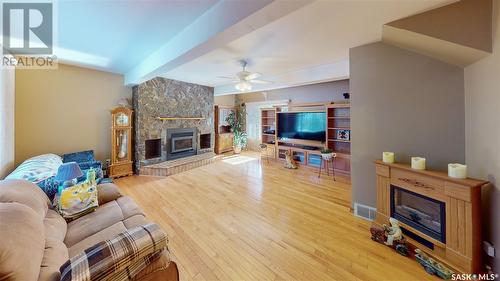 749 Gibson Road, Balgonie, SK - Indoor Photo Showing Living Room With Fireplace