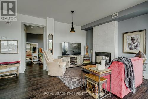 #404 -181 James St N, Hamilton, ON - Indoor Photo Showing Living Room With Fireplace