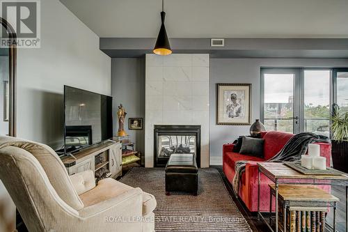 #404 -181 James St N, Hamilton, ON - Indoor Photo Showing Living Room With Fireplace