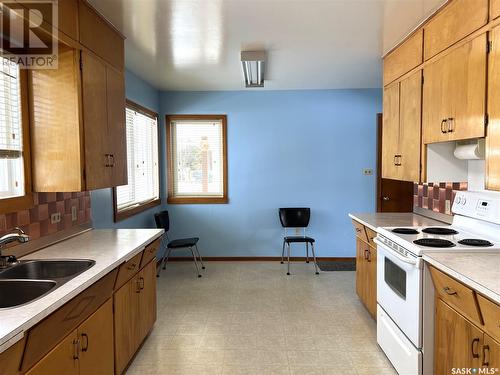 412 1St Street E, Meadow Lake, SK - Indoor Photo Showing Kitchen With Double Sink