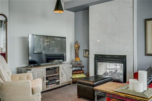 181 James Street N|Unit #404, Hamilton, ON - Indoor Photo Showing Living Room With Fireplace