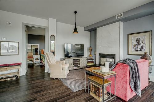 181 James Street N|Unit #404, Hamilton, ON - Indoor Photo Showing Living Room With Fireplace