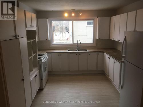 19 Marier Ave N, Ottawa, ON - Indoor Photo Showing Kitchen With Double Sink