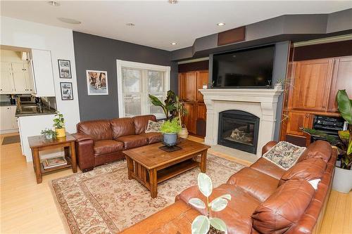 152 2Nd Street Se, Carman, MB - Indoor Photo Showing Living Room With Fireplace