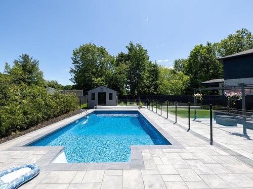 Backyard - 38 142E Avenue, Notre-Dame-De-L'Île-Perrot, QC - Outdoor With In Ground Pool With Backyard
