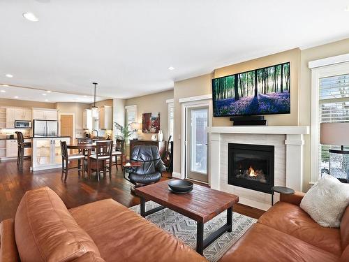 115-1055 Crown Isle Dr, Courtenay, BC - Indoor Photo Showing Living Room With Fireplace