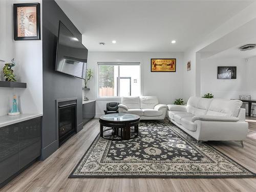 929 Monga Rd, Nanaimo, BC - Indoor Photo Showing Living Room With Fireplace