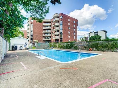 Piscine - 311-450 Rue St-Georges, Saint-Lambert, QC - Outdoor With In Ground Pool