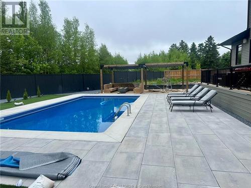 42 Chevreuil Crt, Dieppe, NB - Outdoor With In Ground Pool With Deck Patio Veranda With Backyard