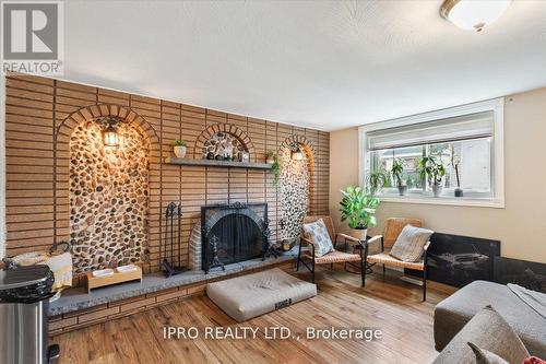 15 Congress Crescent, Hamilton, ON - Indoor Photo Showing Living Room With Fireplace