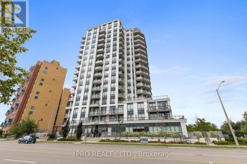 1207 - 840 Queens Plate Drive, Toronto, ON - Outdoor With Balcony With Facade