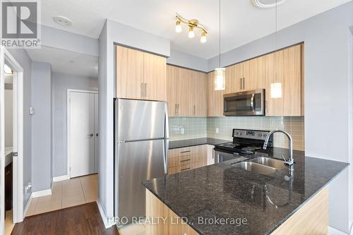1207 - 840 Queens Plate Drive, Toronto, ON - Indoor Photo Showing Kitchen With Stainless Steel Kitchen With Double Sink