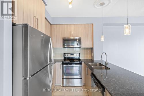 1207 - 840 Queens Plate Drive, Toronto, ON - Indoor Photo Showing Kitchen With Stainless Steel Kitchen With Double Sink With Upgraded Kitchen