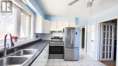 Unit 1 - 30 Grandravine Drive, Toronto, ON - Indoor Photo Showing Kitchen With Double Sink