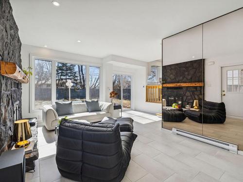 Family room - 4 Rue Riopelle, Gatineau (Aylmer), QC - Indoor Photo Showing Living Room With Fireplace