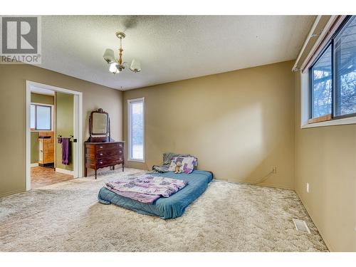 128 Dauphin Place, Penticton, BC - Indoor Photo Showing Bedroom