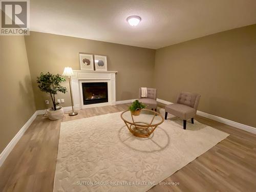 5 Stormont Crt, Muskoka Lakes, ON - Indoor Photo Showing Living Room With Fireplace