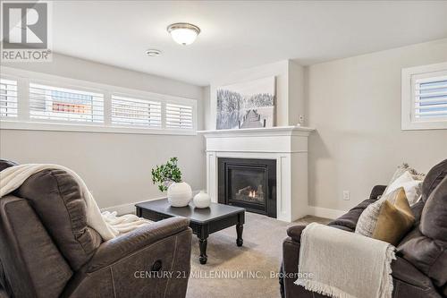 102 White Oak Cres, Blue Mountains, ON - Indoor Photo Showing Living Room With Fireplace
