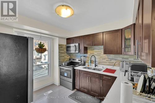 #82 -222 Pearson St, Oshawa, ON - Indoor Photo Showing Kitchen With Double Sink