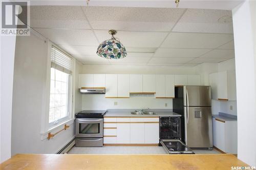 303 609 King Street, Saskatoon, SK - Indoor Photo Showing Kitchen With Double Sink
