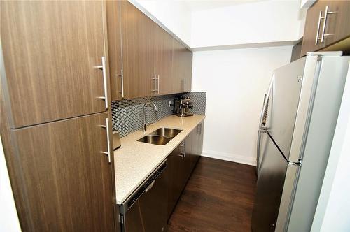 55 Speers Road|Unit #1405, Oakville, ON - Indoor Photo Showing Kitchen With Double Sink