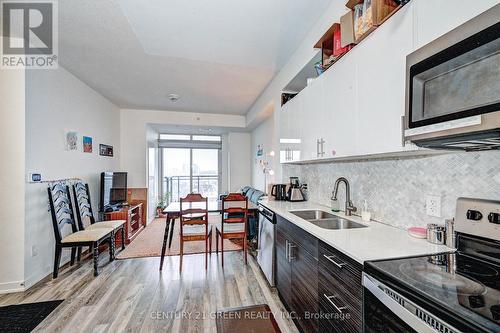 #1402 -128 King St N, Waterloo, ON - Indoor Photo Showing Kitchen With Double Sink