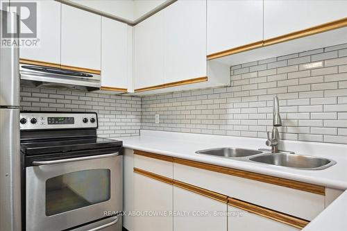 3 - 4195 Longmoor Drive, Burlington, ON - Indoor Photo Showing Kitchen With Double Sink