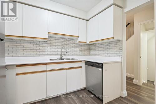 3 - 4195 Longmoor Drive, Burlington, ON - Indoor Photo Showing Kitchen With Double Sink