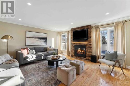 102 Chancery Crescent, Orleans, ON - Indoor Photo Showing Living Room With Fireplace