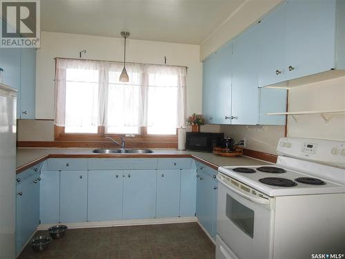 241 Dominion Road, Assiniboia, SK - Indoor Photo Showing Kitchen With Double Sink