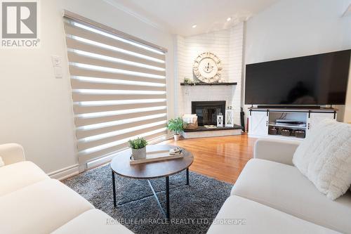 #29 -5020 Delaware Dr, Mississauga, ON - Indoor Photo Showing Living Room With Fireplace