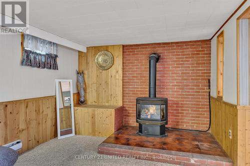 1745 Traders Tr, Smith-Ennismore-Lakefield, ON - Indoor Photo Showing Other Room With Fireplace