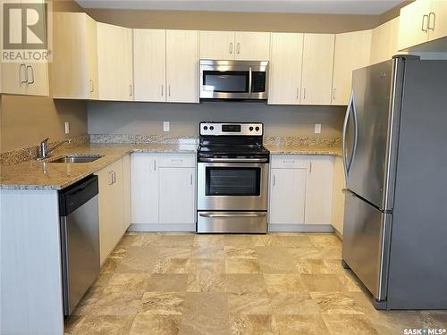 3 & 4 825 Gladstone Street E, Swift Current, SK - Indoor Photo Showing Kitchen With Stainless Steel Kitchen