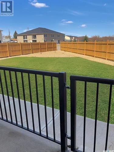 3 & 4 825 Gladstone Street E, Swift Current, SK - Outdoor With Backyard