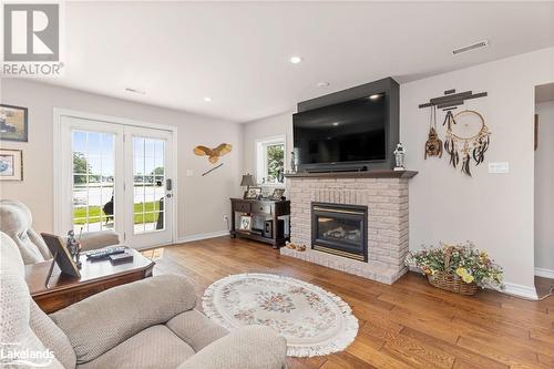 49 Mintens Lane E, Port Severn, ON - Indoor Photo Showing Living Room With Fireplace