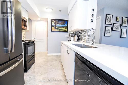 #203 -4 Elsinore Path, Toronto, ON - Indoor Photo Showing Kitchen With Stainless Steel Kitchen With Upgraded Kitchen