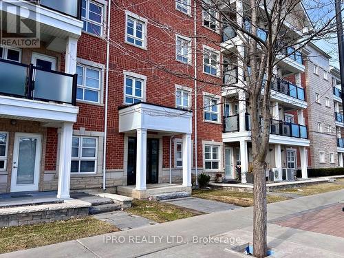 101 - 60 Baycliffe Crescent, Brampton, ON - Outdoor With Facade