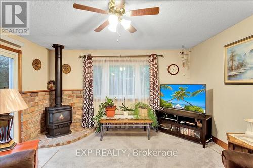 9 Riverside Cres, Wasaga Beach, ON - Indoor Photo Showing Living Room With Fireplace