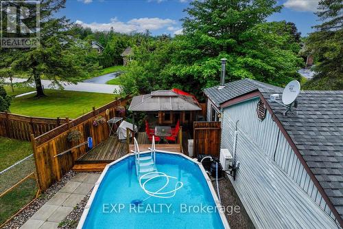 9 Riverside Crescent, Wasaga Beach, ON - Outdoor With Above Ground Pool