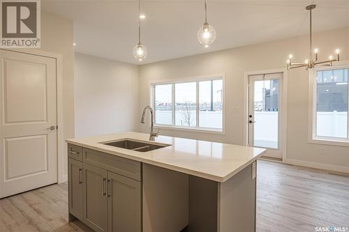 24 625 Dagnone Crescent, Saskatoon, SK - Indoor Photo Showing Kitchen With Double Sink