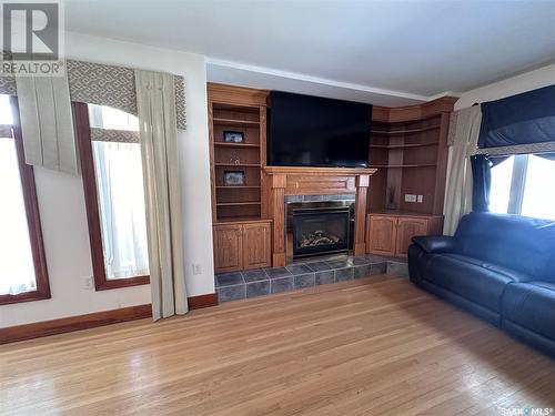 1230 Second Street, Estevan, SK - Indoor Photo Showing Living Room With Fireplace