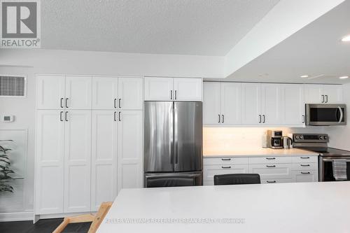 302 - 77 Harbour Square, Toronto, ON - Indoor Photo Showing Kitchen With Stainless Steel Kitchen