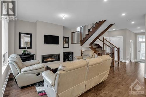 402 Huntsville Drive, Ottawa, ON - Indoor Photo Showing Living Room With Fireplace