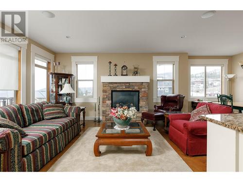 658 Peridot Place, Kelowna, BC - Indoor Photo Showing Living Room With Fireplace